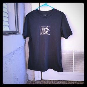 Black VANS tee with pink grim reaper logo